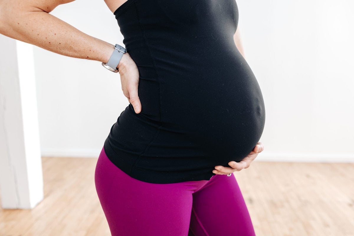 8 Pregnancy Stretches To Relieve Back Pain Video Nourish Move Love