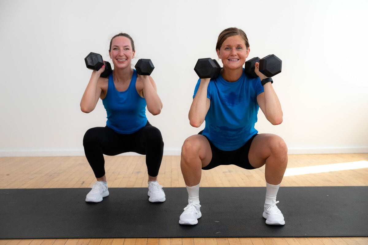 https://www.nourishmovelove.com/wp-content/uploads/2022/10/strength-training-for-women-front-squat-scaled.jpg