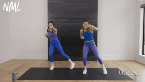 two women performing a series of jabs and tap outs as part of beginner cardio workout at home