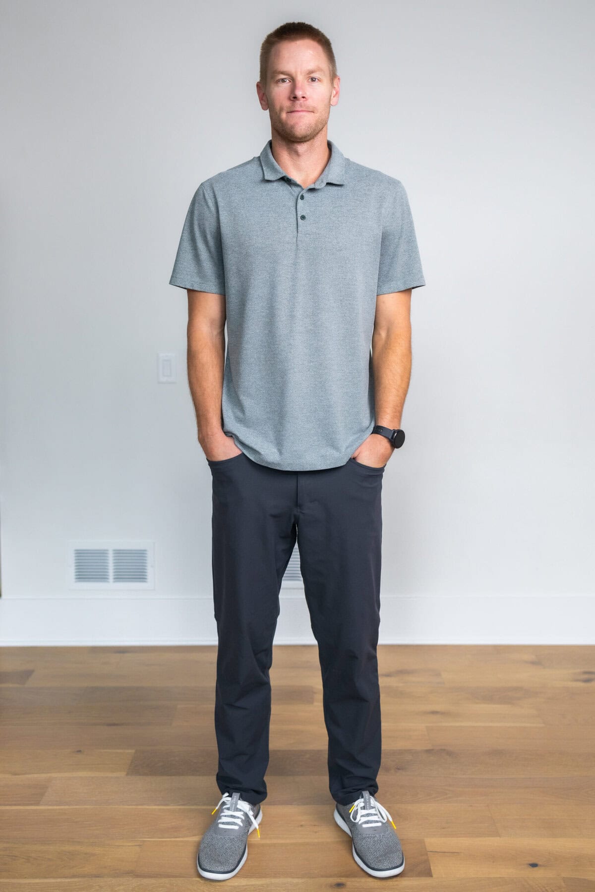 Man wearing Metal Vent Tech Polo from lululemon as part of best lululemon men's gear product review