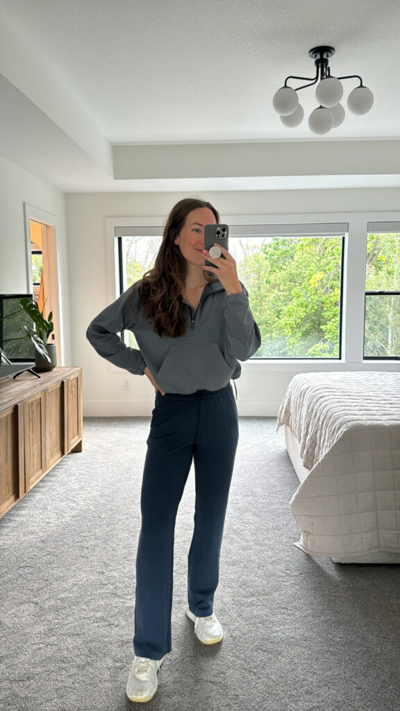 Women wearing blue Softstreme high rise pants with light blue Softstreme sweatshirt from lululemon. 