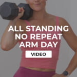 woman holding dumbbell at shoulder height