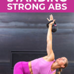 woman performing windmill with kettlebell overhead